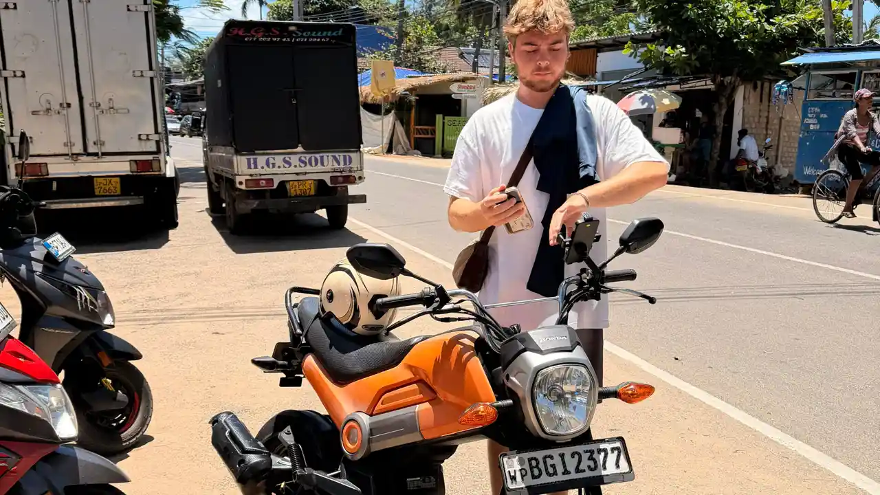 A rental scooter on the coast road at Arugam Bay